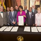 Mayor Rawlings-Blake and leaders of anchor institutions sign the Baltimore City Anchor Plan pledge